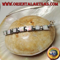 Bracelet montre en argent avec dix-huit opales arlequin carrées