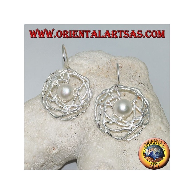 Dangling silver earrings with white freshwater pearl in a round satin weave of threads