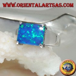 Silver ring with horizontal rectangular blue opal set in four
