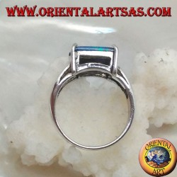 Silver ring with horizontal rectangular blue opal set in four