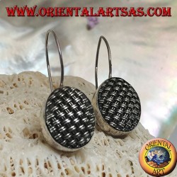 Dangling silver earrings with tightly woven oval
