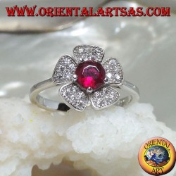 Silver ring in the shape of a wild strawberry flower with a garnet corolla set and zircon petals