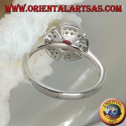 Silver ring in the shape of a wild strawberry flower with a garnet corolla set and zircon petals