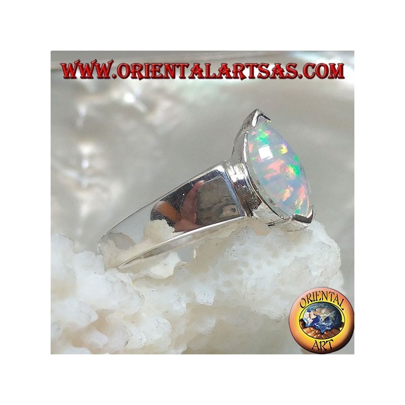 Silver ring with shuttle harlequin opal set on the tips