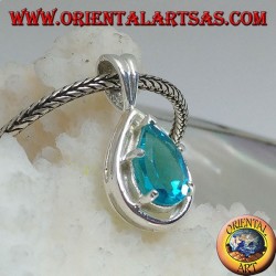 Silver pendant with faceted blue topaz set on a drop-shaped mount