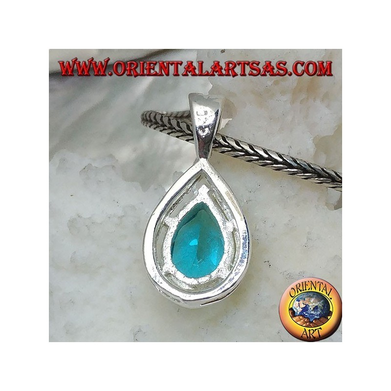 Silver pendant with faceted blue topaz set on a drop-shaped mount