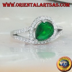 Silver ring with synthetic cross drop emerald set surrounded by zircons