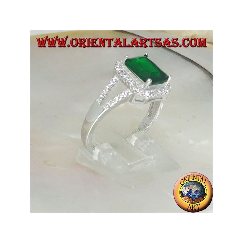 Silver ring with rectangular synthetic emerald set surrounded by zircons and two lateral lines