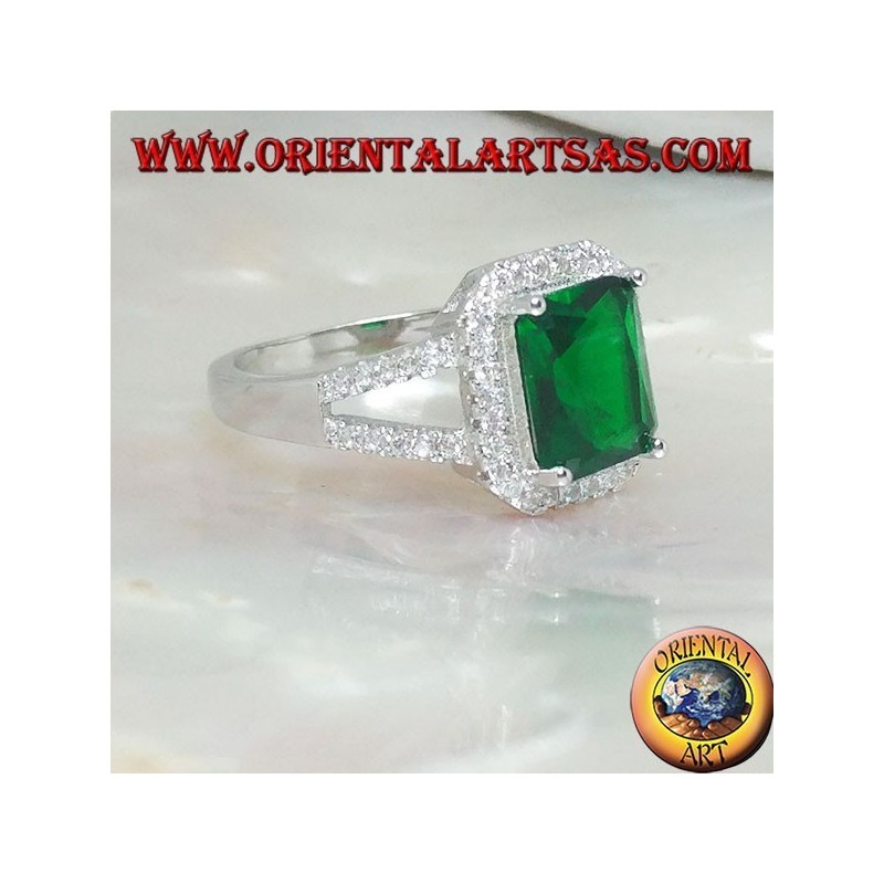 Silver ring with rectangular synthetic emerald set surrounded by zircons and two lateral lines