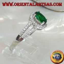 Silver ring with oval synthetic emerald set surrounded by zircons and two lateral lines
