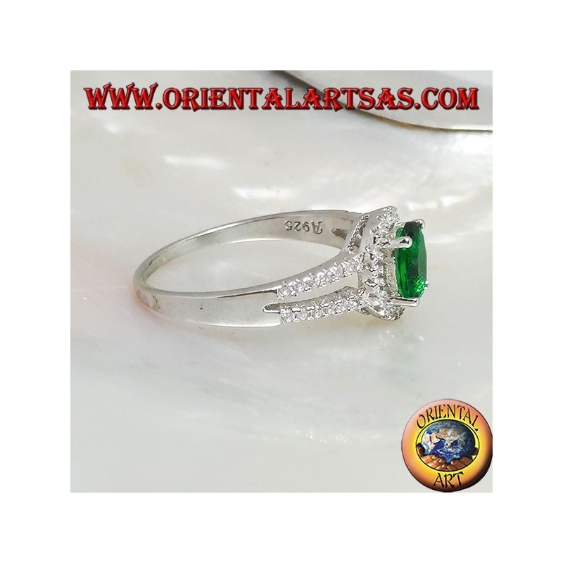 Silver ring with oval synthetic emerald set surrounded by zircons and two lateral lines