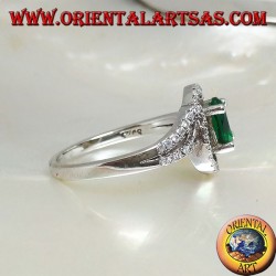 Silver ring with oval synthetic emerald set surrounded by zircons on a concentric setting