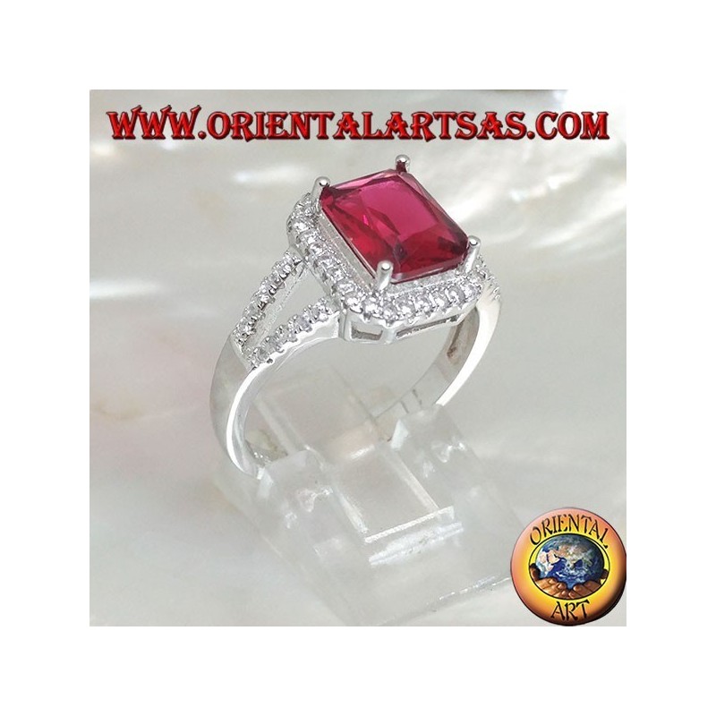 Silver ring with rectangular natural ruby set surrounded by zircons and two lateral lines