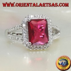 Silver ring with rectangular natural ruby set surrounded by zircons and two lateral lines