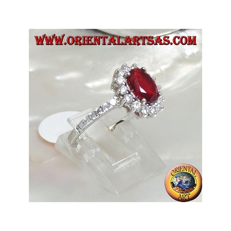 Bague en argent avec rubis synthétique ovale sertie de zircone cubique et rangée sur les côtés