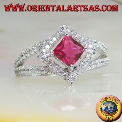 Silver ring with square synthetic ruby set on a rhombus setting with zircons