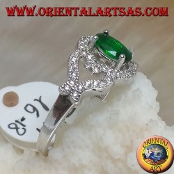 Silver ring with oval synthetic emerald on frame with hearts on the sides studded with zircons
