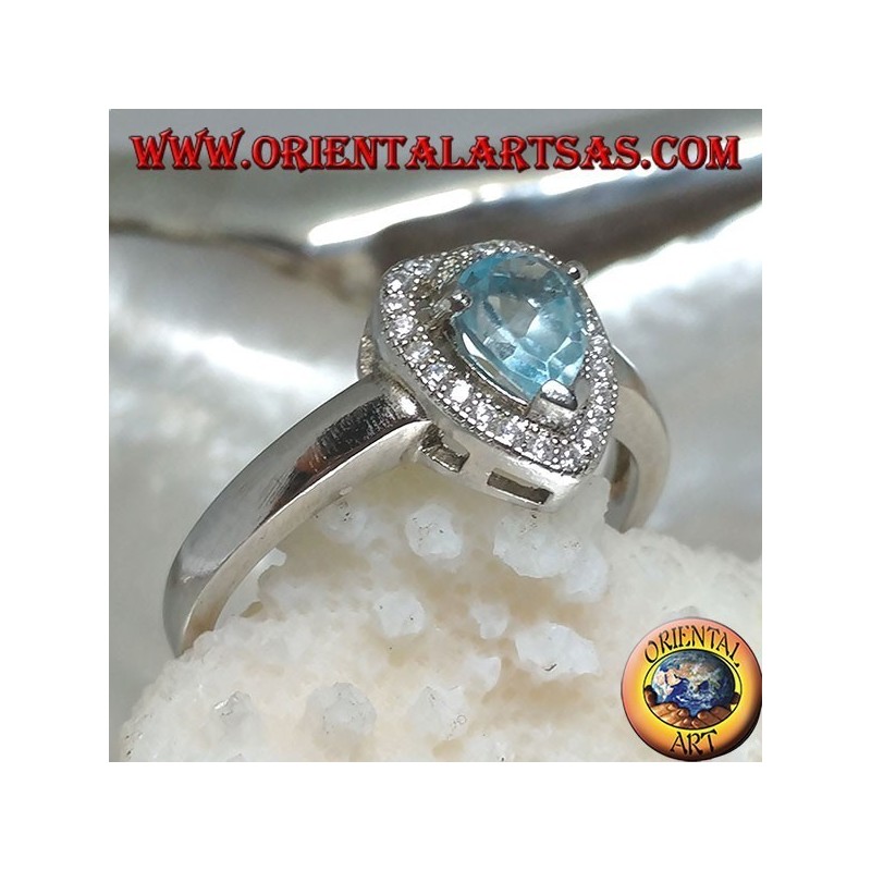 Silver ring with natural blue drop topaz set surrounded by zircons