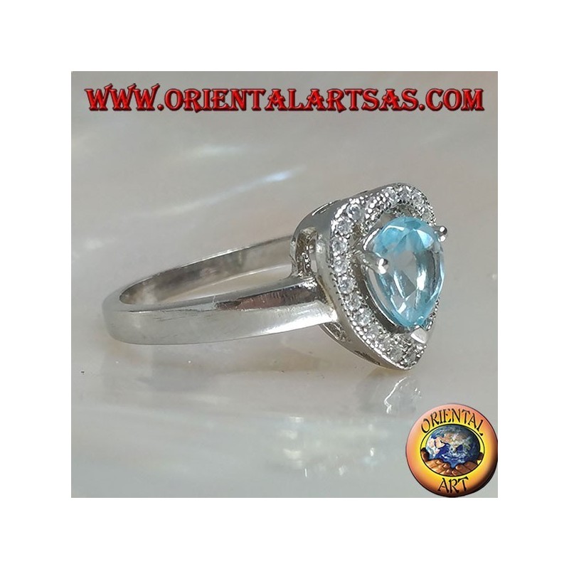 Silver ring with natural blue drop topaz set surrounded by zircons