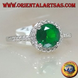 Silver ring with round synthetic emerald set surrounded by zircons