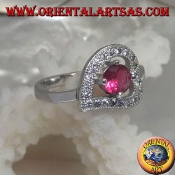 Silver ring in the shape of a horizontal heart with a synthetic round ruby set surrounded by zircons