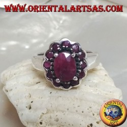 Silver ring with oval natural ruby set surrounded by small round rubies