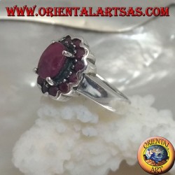 Silver ring with oval natural ruby set surrounded by small round rubies