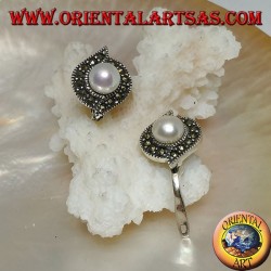 Lever-lock silver earrings with freshwater pearl surrounded by a line of marcasite