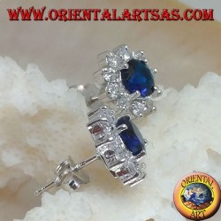 Silver lobe earrings with round synthetic sapphire set surrounded by zircons