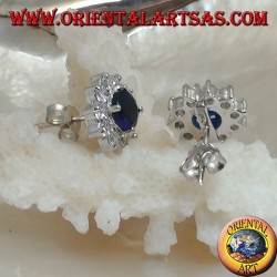 Silver lobe earrings with round synthetic sapphire set surrounded by zircons