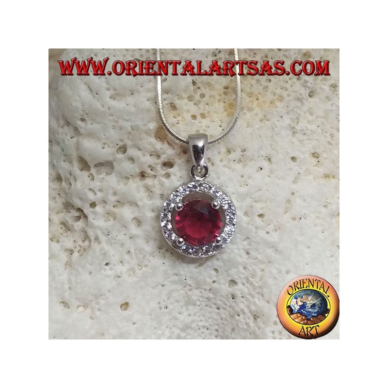 Silver pendant with round synthetic ruby set surrounded by round zircons