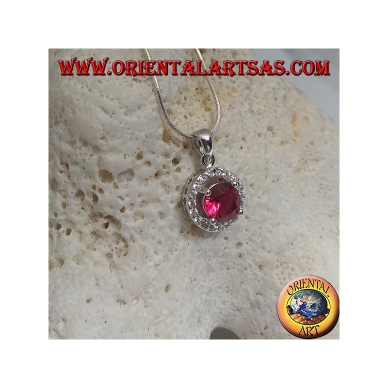 Silver pendant with round synthetic ruby set surrounded by round zircons