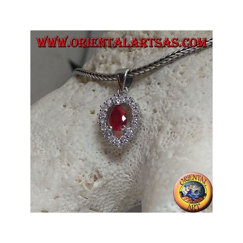 Silver pendant with synthetic teardrop ruby set on an inverted teardrop zircon setting