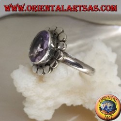 Silver ring with natural oval faceted amethyst surrounded by discs