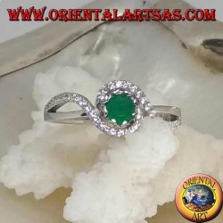 Silver ring with natural round emerald set wrapped in a strip of zircons