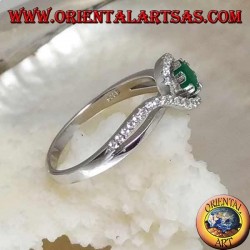 Silver ring with natural round emerald set wrapped in a strip of zircons