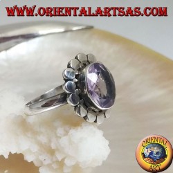 Silver ring with natural oval faceted amethyst surrounded by discs