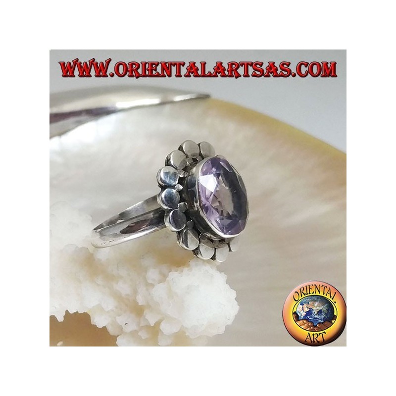 Silver ring with natural oval faceted amethyst surrounded by discs