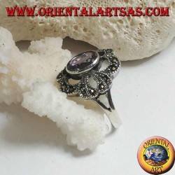 Silver ring with oval natural amethyst on a pierced bow setting studded with marcasite