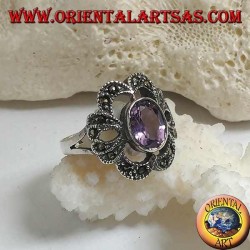 Silver ring with oval natural amethyst on a pierced bow setting studded with marcasite