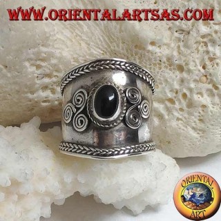 Wide band silver ring with oval onyx and spiral triskéll on the sides, Bali