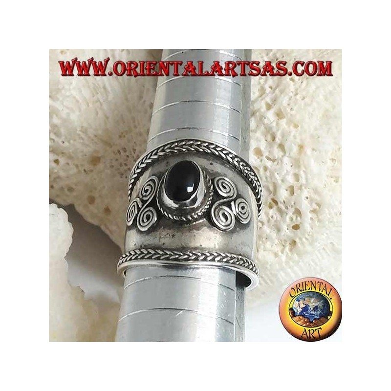 Wide band silver ring with oval onyx and spiral triskéll on the sides, Bali