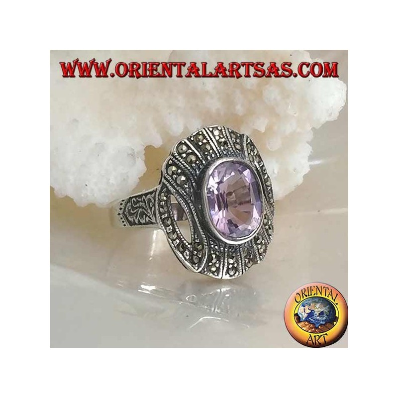 Silver ring with oval natural amethyst on a striped setting studded with marcasite