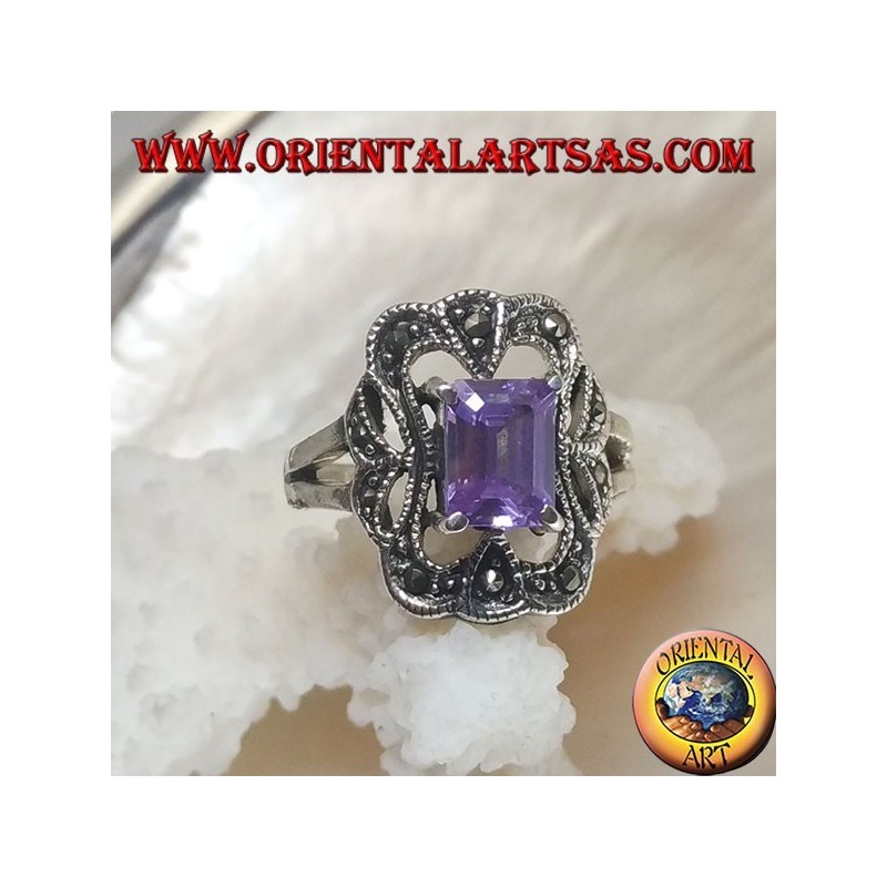 Silver ring with rectangular amethyst colored zircon surrounded by a curved rectangle of marcasite