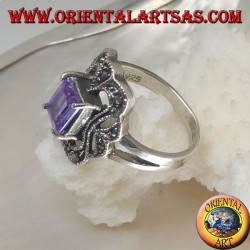 Silver ring with rectangular amethyst colored zircon surrounded by a curved rectangle of marcasite