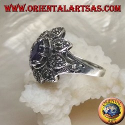 Silver flower ring with central shuttle amethyst-colored zircon and marcasite petals