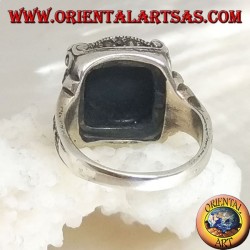 Silver ring with square onyx cabochon in a wavy frame and marcasite around and on the sides