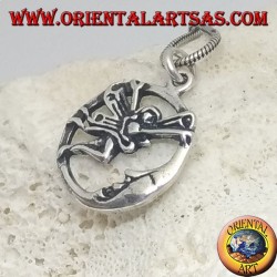 Silver pendant fairy flying in front of the moon in the circle