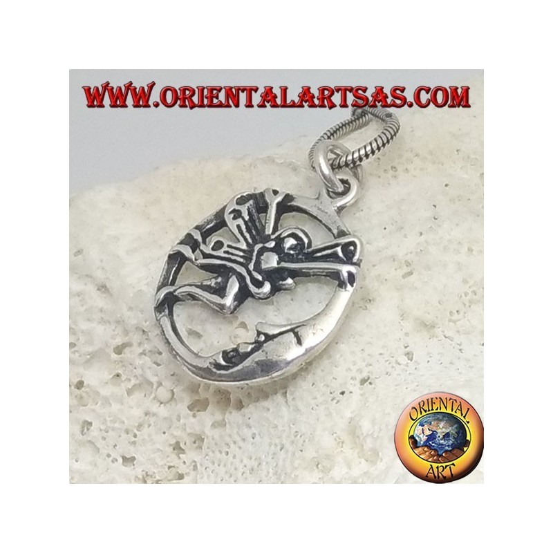 Silver pendant fairy flying in front of the moon in the circle