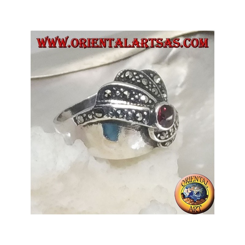 Silver ring with round garnet and concentric spiral marcasite rows